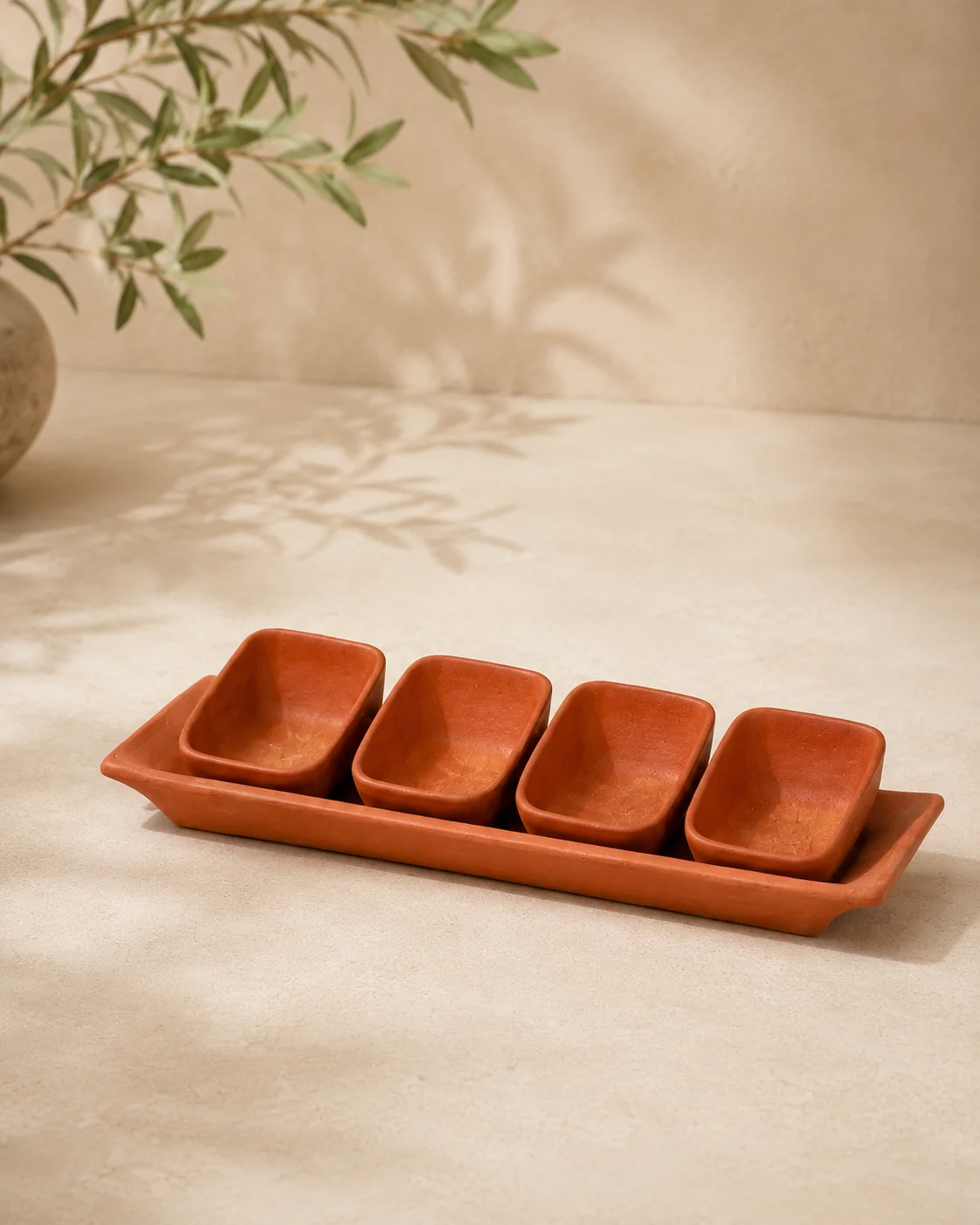 Handcrafted terracotta tray with four serving bowls
